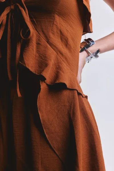 Blusa/Capa Volver Camel